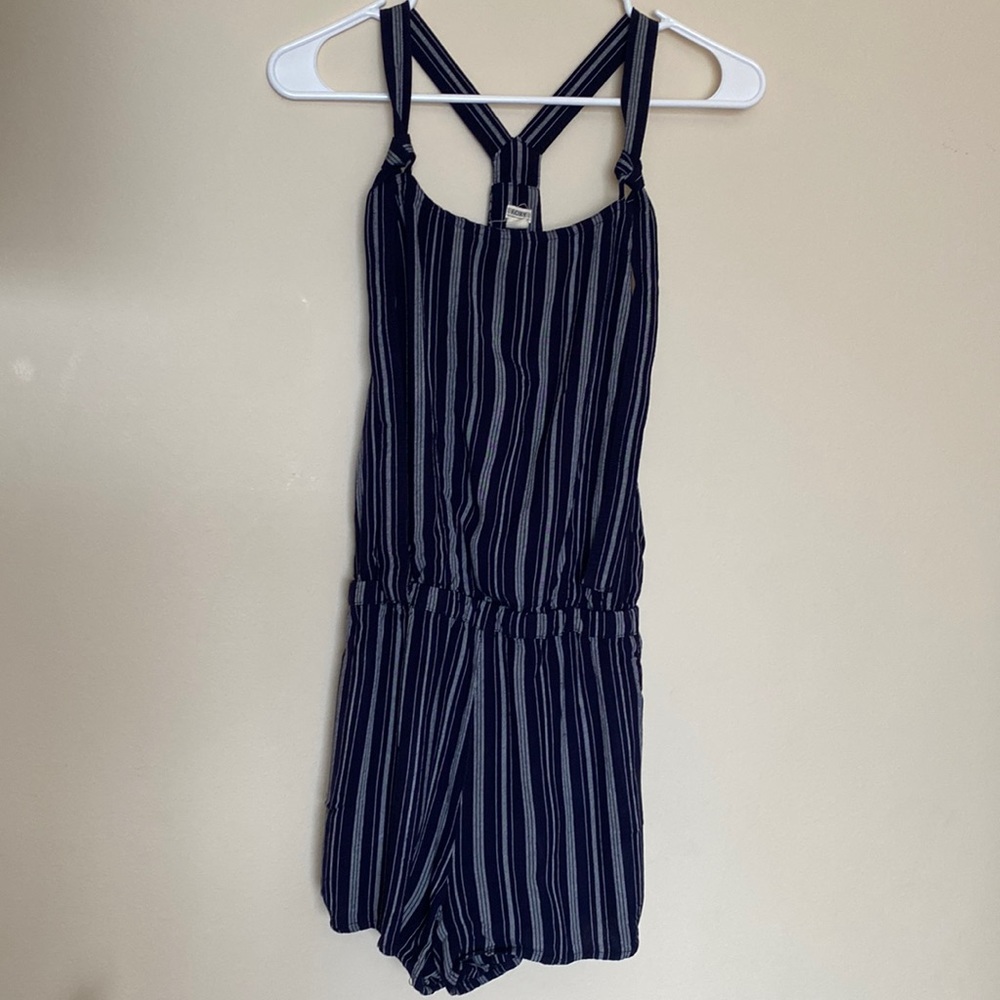 Roxy romper swim cover up with adjustable knotted ties. Front & back pockets